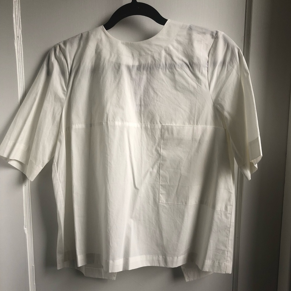White fly away back top